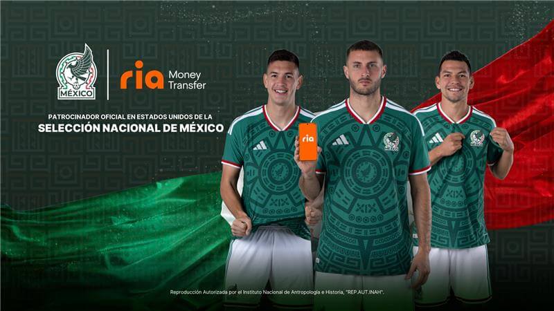 Three soccer players wear green Mexicana national team jerseys and stand before a green and red background. One holds an orange Ria Money Transfer card, with the Mexico team and Ria logos above them.